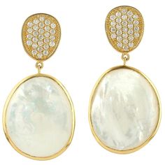 Handcrafted from 18-karat gold, these earrings are set with 27.18 carats of mother of pearl and 1.0 carats of glimmering diamonds. FOLLOW MEGHNA JEWELS storefront to view the latest collection & exclusive pieces. Meghna Jewels is proudly rated as a Top Seller on 1stdibs with 5 star customer reviews. All items manufactured by us are handmade and can be customized or redesigned. Composition Size-43X22 MM Total Weight-15.35 Gold Weight(Gms)-9.714 Diamond Wt(Cts)-1.0 MOP Wt(Cts)-27.18 Pearl Diamond Dangle Earrings, Freshwater Pearl Jewelry, Diamond Dangle Earrings, Gold Diamond Jewelry, Natural Pearl, Pearl Gemstone, Pearl Earrings Dangle, Pearl Diamond, Gold Earrings Dangle