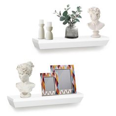 two white shelves with vases, frames and pictures on them in different shapes and sizes