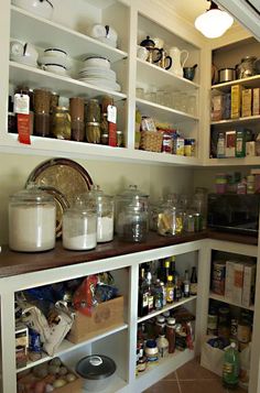 the pantry is stocked with all kinds of food