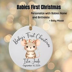 a baby's first christmas ornament with a mouse on it