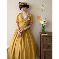 A classic dress that will make you look like a prestigious lady. The waist is high, giving you a beautiful silhouette. For the waist, you can choose between a wide corset or a narrow waist ribbon. The neckline is decorated with frills, and the flared skirt gives an elegant impression. 
 
 
 ＜Item＞ 
 
 Long length 
 Standard length 
 
 
 ＜Waist part＞ 
 
 Corset + waist ribbon 
 waist ribbon 
 
 
 ＜Size＞ 
 
 Long length 
 
 S size 
 
 Length: 125cm 
 Upper body length: 37cm 
 Shoulder width: 33cm Elegant Yellow Dress For Garden Party, Yellow Midi-length Dress With Fitted Bodice, Yellow Fitted Bodice Midi Dress, Yellow Midi Dress With Fitted Bodice, Elegant Yellow Midi Dress With Fitted Bodice, Yellow Retro Dress For Formal Occasions, Elegant Tea Length Dresses For Vintage Fashion, Elegant Tea-length Dresses For Vintage Fashion, Yellow Retro Formal Dress