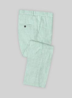 Mint adds a refreshing touch to any outfit, and our Italian Linen Mint Green Pants allow you to incorporate this color from head to toe for a cool and stylish look. Crafted from pure, lightweight, soft, and breathable linen, this striking pants boast a solid texture and a pastel mint green hue that will make you stand out on any occasion, from a summer wedding to a horse racing event.  Look Includes   Italian Linen Mint Green Fabric  Cross Pocket  Flat Front  Two Welted Back Pockets on Trousers Summer Solid Dress Pants With Welt Pockets, Solid Summer Dress Pants With Welt Pockets, Tailored Summer Dress Pants With Pockets, Summer Tailored Dress Pants With Pockets, Tailored Dress Pants With Pockets For Summer, Tailored Solid Pants For Summer, Green Dress Pants With Welt Pockets For Spring, Summer Cotton Dress Pants, Linen Dress Pants Trousers For Summer