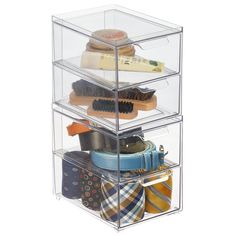 three tiered clear acrylic storage container with ties and neckties in it