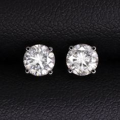 Why we love it:These diamond stud earrings offer a forever classic look.Highlights:- 1.18ct pair of natural diamonds- Round brilliant cut for lively brilliance- Beautiful white face up with H color- Inclusions blend well with SI3 clarity. Will appear eye clean when worn- Classic 14k white basket settings with friction backs 14k White Gold Brilliant Cut Earrings For Anniversary, White Round Diamond Earrings, Round White Gold Lab Grown Diamond Earrings, Round White Gold Lab-grown Diamond Earrings, Moissanite Diamond Earrings With Prong Setting In Diamond White, Brilliant Round Cut Platinum Diamond Earrings, Diamond White Moissanite Earrings With Prong Setting, Platinum Round Diamond Earrings Fine Jewelry, White Round Cut Diamond Earrings With Single Diamond