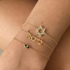 The 14K Gold Personalized Hebrew Nameplate Bracelet is a luxurious piece of jewelry to adorn your wrist. Crafted from 14k solid gold, the bracelet features a personalized plate with a Hebrew name of your choice, to add a unique touch of sophistication and modern elegance. Wear this classic and timeless piece of jewelry to show off your personal style. For personalization, enter the Hebrew name in the designated box. If you are unable to type in Hebrew, please use Google Translator to convert you Luxury Gold Nameplate Bracelet, Personalized Nameplate Gold Bracelet, Luxury Personalized Nameplate Gold Bracelet, Hebrew Bracelet, Hebrew Necklace, Nameplate Bracelet, Cuban Link Necklace, Feminine Necklace, Ear Art