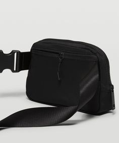 Phone, keys, wallet. Keep them close in this versatile belt bag that helps you get out the door and on to your next adventure. Designed for On the Move. Dimensions: 19 cm x 5 cm x 13 cm (7.5" x 2" x 5"):Volume: 1L. Zippered pockets. Easy-access, exterior pocket for your essentials. Interior pocket. 'Spot clean', 'Do not wash', 'Do not bleach', 'Do not tumble dry', 'Do not iron', 'Do not dry clean', 'Imported'. Water-Repellent Fabric. Mesh: 100% Polyester. Lining: 100% Polyester. Body: 100% Nylon Everywhere Belt Bag, Water Repellent Fabric, Bags Purses, Free Bag, The Door, Belt Bag, Purse Wallet, Water Repellent, Zipper Pocket