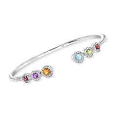 Ross-Simons - 1.29 ct. t. w. Multi-Gemstone Cuff Bracelet in Sterling Silver. 8". An RS exclusive. Add this beautiful cuff bracelet into the mix, and your stack will look better and brighter than ever before! Features vibrant .89 ct. tot. gem wt. rhodolite garnet, amethyst, citrine, Swiss blue topaz, peridot and garnet rounds encapsulated by shimmery .40 ct. t. w. white topaz halos. Crafted in sterling silver. Slip-on, multi-gemstone cuff bracelet. Garnet birthstones are the perfect gift for Jan Peridot And Garnet, Gemstone Cuff Bracelet, Pearl Jewelry Shop, Garnet Birthstone, Fine Jewelery, Mixed Metal Jewelry, Peridot Stone, Citrine Stone, Cz Stud Earrings