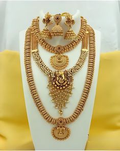 Description: Enhance your elegance with this stunning Traditional Indian Kundan Necklace Set featuring matching earrings, meticulously crafted to perfection. This exquisite jewelry set is the epitome of luxury, blending traditional design with contemporary flair, making it a must-have for every jewelry collection. Product Features: Material: High-quality Kundan stones, gold-plated alloy, and pearl detailing. Design: Intricately designed with a beautiful combination of beads that add a pop of col Temple Necklace, Earrings Matching, Kundan Necklace Set, Traditional Indian Jewellery, Kundan Necklace, Bollywood Jewelry, Bridal Jewellery Indian, Kundan Necklaces, Indian Bollywood