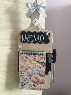 a wooden memo board attached to a wall