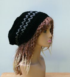 "Slouchy beanie style Hippie tam in solid black and charcoal gray zig zagging stripes. Worked in a closed double-loop, v-stitching and some open weave pattern it makes a great all-year-around tam. Great for smaller heads with less volume hair and short dreadies. Stretchy and ideal to wrangle your hair! Soft, sturdy and colorfast acrylic yarn, easy laundry care. Measurements: 9 inches LONG (depth) Head opening is about 20 inches unstretched and stretches to 26 inches. (Hidden tie-string is added Less Volume Hair, Small Dreadlocks, Woman Beanie, Small Dreads, Tam Hat, Slouch Beanie, Beanie Style, V Stitch, Man Hat