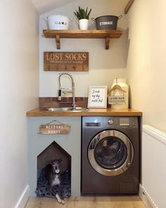 a laundry room with a washer and dryer in the corner next to it