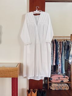 The April Nightgown is a breath of fresh air - Light and breezy cotton with buttons down the front and pockets (hello!) lend to this effortless feel. Easy to layer and wear as a day dress as well a breezy and comfy option for lounging and sleep. Made by Powell Craft UK Est 1962 and made in India. Comfortable Cotton Nightgown For Lounging, Comfortable Cotton Nightgown For Spring, Spring Cotton Nightgown For Home, White Cotton Nightgown For Lounging, Cotton Nightgown With Relaxed Fit For Daywear, White Relaxed Fit Nightgown For Sleep, Relaxed Fit Cotton Nightgown For Casual Wear, Cotton Relaxed Fit Nightgown For Spring, Summer Nightgown With Relaxed Fit For Sleep