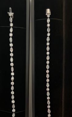 This unique and stunning tennis bracelet features DEF VVS/VS marquise and round lab diamonds on 14k white gold and a box clasp with a single butterfly style closure. Carats are calculated based on 7 inch length= 6.5 carats total weight. If you would like a sample of this bracelet in crystalline on silver instead of diamonds on white gold, please contact us and we will invoice it at $300. The crystalline and silver version of this bracelet has a double butterfly closure on the side of the box cla Luxury Marquise Cut Diamond Bracelet For Formal Occasions, Luxury Marquise Cut Diamond Bracelet For Formal Events, Luxury Marquise Diamond Bracelet For Formal Occasions, Marquise Diamond Cut Diamond Bracelet, Marquise Cut Diamond Bracelet For Formal Occasions, Marquise Diamond Cut Bracelet, Luxury Wedding Diamond Bracelet With Marquise Cut, Formal Marquise Cut Diamond Bracelet, Diamond Tennis Bracelet With Marquise Prong Setting