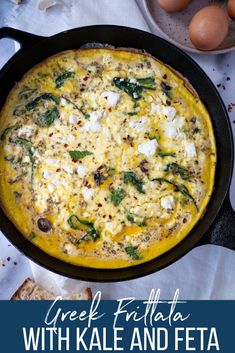 an egg frittata with kale and feta in a cast iron skillet