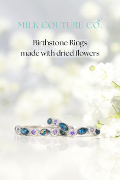 The Blessing & The Heirloom birthstone rings made with dried funeral flowers. The Heirloom also has crushed opal added. Birthstones are amethyst. #breastmilkjewelry #cremationjewelry #memorialjewelry #flowerpreservation #memorial #grief #griefquotes Elegant Multi-stone Open Birthstone Ring, Heirloom Jewelry With Center Stone For Promise, Anniversary Jewelry With Multi-stone Round Cut, Anniversary Multi-stone Round Cut Jewelry, Timeless May Birthstone Ring For Gift, Heirloom Sapphire Birthstone Ring For Promise, Timeless Birthstone Ring For Promise, Fine Jewelry Cluster Ring With Birthstone For Promise, Promise Cluster Ring With Birthstone