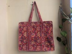 Women Tote Bag Handmade Block Printed Quilted Shoulder Bag's Indian Shopping Handbag Throw Cotton Quilted block print weekend bags 100% cotton fabric SIZE:- 14 inch X 17 Inch X 6 Inch  Usage : Cosmetic, Make-up, Travel, Toiletries, Tote Bag, Medicine, Accessories, Shoulder Bags, Handle Bag, Women Bags, Cosmetic Bag, Gift For Her, Bridesmaid Bag, Storage Bag, Grocery Bag, Shopping Bag, Carry Bags, Jhola Bag, Market Bag, Vintage Bags, Picnic Bags, Etc Shopping and much more. Perfect for Beach Visits/ Quick Grocery runs/ Carrying Kids items/ Artist Paint book and Paints /Extra Bag Washable on Cold / Delicate wash Gorgeous Prints of Hand printed cotton are brought together to give an alternate to plastic bags usage . Posted in a flat pack folded. NOTE: ✔ Disclaimer: Natural-dyed colors might b Reversible Square Bags, Red Rectangular Beach Bag For Everyday Use, Multicolor Rectangular Beach Bag For Daily Use, Multicolor Reversible Cotton Bag, Multicolor Reversible Rectangular Shoulder Bag, Daily Use Reversible Rectangular Shoulder Bag, Rectangular Cotton Reversible Bag, Casual Multicolor Reversible Shoulder Bag, Reversible Cotton Rectangular Bag