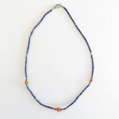 Necklace composed of blue seed beads, carnelian beads colors: blue, orange, turquoise hook clasp Length 21 cm Delivered in a gift bag Bohemian Blue Lapis Lazuli Beaded Necklace, Artisan Blue Beaded Necklaces With Gemstone Beads, Artisan Blue Gemstone Beaded Necklaces, Artisan Blue Beaded Necklace With Natural Stones, Artisan Blue Gemstone Beaded Necklace, Blue Polished Bead Necklaces For Beach, Artisan Blue Gemstone Beads, Blue Polished Beads Necklace For Beach, Artisan Blue Beaded Necklace With Tiny Beads