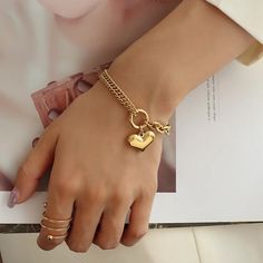 SPECIFICATIONSBrand Name: RamosGender: WomenMaterial: MetalMetals Type: STAINLESS STEELBracelets Type: Chain & Link BraceletsOrigin: Mainland ChinaCN: GuangdongChain Type: Link ChainItem Type: BRACELETSCompatibility: All CompatibleShape\pattern: HEARTModel Number: A-S236Setting Type: Bezel SettingFine or Fashion: fashionStyle: TRENDYFunction: Mood TrackerChoice: yessemi_Choice: yes●The material of the product is made of stainless steel.Will not fade after contact with water.Will not darken.Prevent allergies.●Apply to Occasion: Party, wedding ,engagement, gift for friend Mom sisters wife.●The package will not contain any information about our store and product prices.If you have any questions, please contact customer service. Gold Charm Bracelet For Women As Gift, Luxury Everyday Charm Bracelet For Women, Cheap Gold Charm Bracelet For Mother's Day, Cheap Gold Bracelets For Mother's Day, Modern Luxury Gold Charm Bracelet, Luxury Gold Modern Charm Bracelet, Elegant Bracelets For Mother's Day At Affordable Prices, Luxury Modern Name Bracelet For Everyday, Luxury Personalized Stainless Steel Jewelry