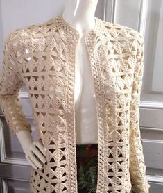 50s-60s crochet cardigan, lace pattern summer sweater, no buttons, romantic cardigan, bohemian boho summer sweater, beige color, geometric pattern, handknitted sweater. Belt is not included. No label, but because the cardigan is heavy in weight, I can supose that it could be wool. Measurements laying flat : shoulders: 37 cm (14,5 inches) armpit to armpit :42 cm (16,5 inches) total lenght:58 cm (23 inches) sleeve lenght :54 cm (21 inches) 60s Crochet, Handknitted Sweater, Puffy Sleeve Top, Cardigan Au Crochet, Green Sleeveless Blouse, Spring Cardigans, Beige Pullover, Pull Beige, Sheer Sweater