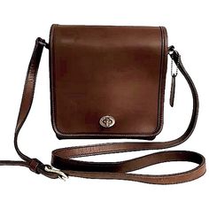 Dark Brown Leather. Brass Hardware. Outer Pocket On Back. Adjustable Strap, Drop 21 1/2''. Flap Over With Twist Lock Closure. Inside Zipper Pocket. Size; W 7 1/2'' X H 7 1/2'' X D 3''. # L8p-9076 Coach Vintage Companion Flap 9076 Leather. 9063114/325 C&Buvcbr2 Last Photo Is To Give You An Idea Of Size. I Have Taken The Time To Clean This Bag Inside And Out And Condition. Coach Motto; The Scars, Scratches, Veins And Wrinkles Are Natural Marking Characteristics Of Full Grain Leather. Light Scuffs On Hardware And Bottom Corners. Has A Split/1/2 Hang Tag. Overall In Very Good Vintage Condition. Designer Leather Shoulder Bag With Coin Pocket, Elegant Everyday Bag With Coin Pocket, Elegant Bags With Coin Pocket, Elegant Leather Shoulder Bag With Coin Pocket, Classic Formal Shoulder Bag With Coin Pocket, Classic Shoulder Bag With Coin Pocket, Coach Bags With Coin Pocket For Everyday Use, Classic Coach Shoulder Bag With Leather Lining, Luxury Coach Bag With Coin Pocket