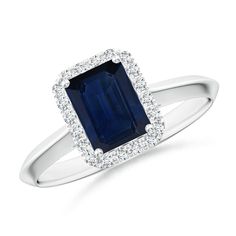 a blue sapphire and diamond ring in white gold