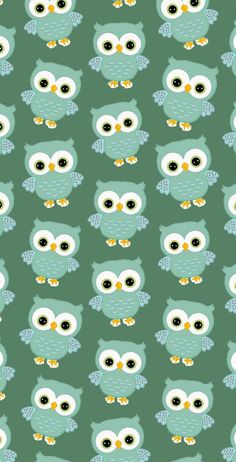 an owl pattern on a green background