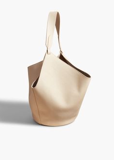 A scarf-inspired tote designed to be especially lightweight, with rounded base for stability. Includes removable leather pouch and dust bag. Medium Tote, Leather Pouch, Pebbled Leather, Calf Skin, Lotus, Dust Bag, Pouch, Leather