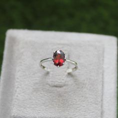 * Material: 925 Sterling Silver * DETAILS ✥ Handmade Ring ✥ - Center Stone: Natural Garnet - Center Stone Size: 6X8 MM - Center Stone Shape: Oval  - Band Color: Silver Shiny ✥ O T H E R ∙ I N F O R M A T I ON ✥ ♦ Your item will be nicely packed to gift in elegant jewelry boxes. ♦ Custom Order We can make custom rings in almost any shape and style. If you want a specific model, please send us a clear picture and we will do our best. ♦ Delivery All Item will be Shipped within 3 to 5 Days after pay Oval Garnet Rings As Gift, Oval Garnet Ring For Gift, Oval Ruby Ring In Sterling Silver As Gift, Oval Garnet Ruby Ring As Gift, Oval Solitaire Ruby Ring Gift, Oval Ruby Ring In Sterling Silver, Oval Garnet Birthstone Ring As Gift, Oval Ruby Ring Stamped 925 For Gift, Oval Ruby Ring Stamped 925 As Gift