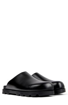 A surprisingly lightweight sole brings everyday comfort to this minimalist mule crafted from smooth leather. Cushioned footbed Leather upper and lining/synthetic sole Imported Mens Mules, Half Shoes, Zara Sandals, Leather Slippers, Zara Man, Mens Sandals, Smooth Leather, Trending Shoes, Clogs