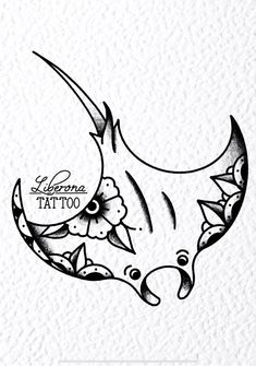 a black and white tattoo design with flowers on it