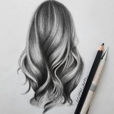 a pencil drawing of a woman's head with long hair