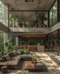 a living room filled with lots of furniture and plants on top of the floor next to windows