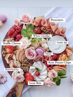 a wooden platter filled with different types of food