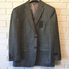 Pair This Very Nice Sports Coat With A Pair Of Dress Or Casual Pants For A Classic And Sophisticated Look. Features: Size 40 Regular Single Breasted, 2 Button Closure 4 Buttons On The Sleeves Notched Lapel Center Vent Flat Pockets 60% Will / 40% Viscose Rayon Dry Clean Only Retails $225 Gray Business Outerwear With Suit Collar, Gray Suit With Suit Collar For Winter, Gray Fitted Suit With Long Sleeves, Fitted Gray Suit With Long Sleeves, Fitted Gray Winter Suit, Fitted Gray Tweed Jacket For Business, Gray Winter Suits, Fitted Gray Suits, Gray Winter Sport Coat With Suit Collar