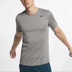 Brand New!! Never Worn!! The Nike Dri-Fit Legend T-Shirt Is An Essential Layer With An Odor-Resistant Finish That Helps Keep You Fresh Through Workouts At Any Level. Lightweight Fabric Breathes And Wicks Sweat So You Stay Cool And Dry From Warmups Well Into The Afterburn. Athletic Heather Workout Tops With Short Sleeves, Athletic Heather Short Sleeve Athleisure Top, Athletic Heather Short Sleeve Tops For Athleisure, Nike Relaxed Fit T-shirt For Gym, Athletic Heather Workout T-shirt, Gray Go-dry T-shirt For Workout, Athletic Heather Short Sleeve Gym Tops, Athletic Heather Short Sleeve Tops For Gym, Gray Moisture-wicking Short Sleeve T-shirt