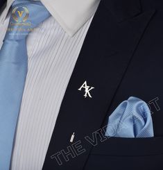 Introducing our custom initial lapel pins, a timeless accessory that adds a touch of elegance and personal touch to any outfit. These stunning lapel pins are not just accessories; they are a statement of style and sophistication, an excellent choice for groomsmen proposals, wedding gifts, anniversary gifts, Christmas gifts, or simply a thoughtful gift for him. Our initial lapel pins are meticulously handcrafted from high-quality stainless steel, ensuring durability and a lasting shine. They measure between 22mm-25mm, an ideal size that adds a subtle yet noticeable touch to any suit or jacket. Each pin is custom-made, allowing you to choose the initial that holds significance to you or the person you're gifting it to, making it a truly personalized present. These wedding gifts are not just Silver Elegant Enamel Pin For Formal Use, Silver Elegant Enamel Pin For Formal Events, Elegant Silver Enamel Pin For Formal Occasions, Elegant Formal Enamel Pin Brooch, Classic Silver Lapel Pin For Business, Formal Gold Enamel Pin, Elegant Silver Enamel Pin For Weddings, Classic Lapel Pin Gift, Classic Gift Lapel Pin