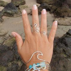 "Silver Wave Bangle~ Love the beach and the surf, then this bangle is just for you! Handmade sterling silver wave bangle hammered and polished to a beautiful shine. Fun summer beach jewelry! *This listing is for a sterling silver wave bangle made to order in your size* **Made with 14 gauge sterling silver, thinner than our other bangles** Please view the last picture on this listing that shows how to measure for your correct size as there will be a charge for size exchange! For correct size meas Wave Rings, Beachy Fashion, Silver Surf, Mermaid Accessories, Gold Wave Ring, Wave Runner, Bracelet Rings, Wave Jewelry, Jewelry Ocean