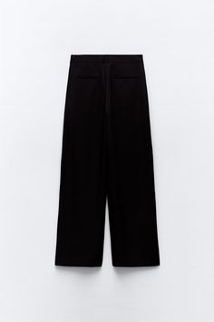 WIDE LEG PAREO PANTS - Black | ZARA United States Baggy Wide-leg Pants For Work, Classic Baggy High-waist Bottoms, Baggy High Waist Dress Pants With Pockets, High Waist Baggy Dress Pants With Pockets, Baggy Trousers With Welt Pockets, Baggy High-waisted Pants With Welt Pockets, Baggy Workwear Bottoms With Hip Pockets, Chic High Waist Bottoms With Cargo Pockets, Chic High-waisted Bottoms With Cargo Pockets