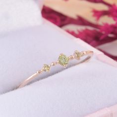 Unique peridot promise ring for her, Small & Dainty rose gold womens peridot ring, Simple 3 stone promise ring, Delicate promise ring WE OFFER UNLIMITED PERIOD INSTALLMENTS PLAN This is a beautiful, stunning, feminine ring that works well for all occasions, styles, and ages. You will love it! Ring information: Stones: Peridot Approximate size: 2.5mm (1 stone) Approximate size: 1.5mm (2 stones) Metal type: Gold Metal stamp: 14k Gold Installment Payments We offer installment payments for an un Promise Rings Peridot, Women’s Promise Rings, Dainty Green Ring, Dainty Peridot Ring, Aesthetic Promise Rings Gold, Peridot Promise Ring, Green Peridot Stackable Promise Rings, Green Three Stone Promise Jewelry, Green Peridot Promise Jewelry