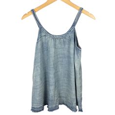 Anthropologie Pilcro Chambray Swing Blouse Color: Denim Light Sleeveless, Tank Top, Swing Silhouette, Pullover Styling, Rear Button Detail, Frayed Hem Sweep. Lightweight 63% Cotton, 37% Lyocell Chambray Fabric. Machine Wash. Condition: New With Tag. Never Worn. Smoke Free. Size: X-Small Measurements (Flat): Underarm To Underarm - 17" Hem Sweep - 28" Length (Front/Center - Neckline To Hem) - 19" I Recommend Doing An Online Search To Read Anthropologie Purchaser Reviews About A Garment’s Sizing An Casual Medium Wash Denim Tank Top, Casual Denim Blue Vest Top, Medium Wash Vest Top For Spring, Casual Sleeveless Denim Tank Top, Denim Blue Vest Top For Spring, Casual Sleeveless Denim Vest Top, Casual Tank Top Vest, Casual Blue Denim Vest Top, Casual Sleeveless Medium Wash Top