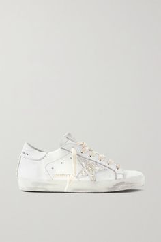 EXCLUSIVE AT NET-A-PORTER. Made in Italy from white leather, Golden Goose's 'Superstar' sneakers have been carefully hand-distressed by artisans in the brand's Venetian atelier - so while this pair looks love-worn, it feels brand new. They're embellished with lustrous faux pearls filling in the signature star. -- Rubber sole measures approximately 25mm/ 1 inch - White leather (Cow) - Lace-up front - Made in Italy White Sneakers Designer, Clean Golden Goose Sneakers, Golden Goose With Wedding Dress, Pearl Golden Goose, Golden Goose Wedding Shoes, Wedding Golden Goose, It Girl Sneakers, White Golden Goose, Shoes Preppy