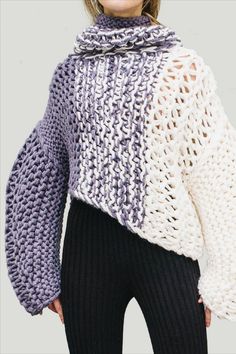 This statement sweater is made from merino wool mixed yarn and knitted in a way that creates a gradient going from purple on one shoulder to white one the other. Tke knit is both loose on the body and shaped on the shoulders to create a perfect statement! | NOT JUST A LABEL stands for authentic luxury, fine craftsmanship and innovative design. Discover more emerging luxury fashion and shop thousands of personalized and tailor-made designs directly from the world's most exciting couture talent. Fall Layering Cropped Knit Sweater, Cozy Stretch Knit Sweater, White Chunky Knit Stretch Sweater, White Stretch Sweater With Chunky Knit, Slouchy White Winter Sweater, White Stretch Chunky Knit Sweater, White Slouchy Winter Sweater, Knit Cropped Sweater For Winter, Winter Cropped Knit Sweater For Layering