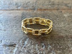 Vintage 14K Yellow Gold Chain Ring Sz 6 Very pretty and delicate ring.  Marked: SK 14K Turkey Approx. Dimensions: Ring size 6, 5.0mm W Elegant Gold Chain Rings For Everyday Wear, Elegant Everyday Yellow Gold Chain Ring, Classic Gold Chain Ring With Round Band, Elegant 14k Gold Rings With Chain Detail, 14k Gold Oval Midi Rings, Elegant Gold Oval Link Ring, Oval 14k Gold Midi Rings, Classic Gold Chain Ring, 14k Gold Chain Ring Fine Jewelry