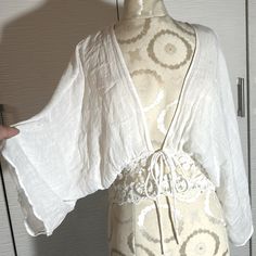 New With Tags On. Super Lightweight And Airy, Ties On The Front, Gorgeous Lace Around The Waist. Wide Kimono Style Sleeves That Are 2/3 In Length. Absolutely Stunning Piece, More Of A Style Statement Than A Coverup To Be Honest, Goes Really Well With Any Summer Outfit. Size M. Grey44 Casual V-neck Cover-up For Day Out, Chic Long Sleeve Loungewear Cover-up, Spring Summer V-neck Cardigan, Cotton V-neck Cover-up For Day Out, V-neck Cotton Cover-up For Day Out, White V-neck Loungewear Cover-up, White V-neck Cover-up For Loungewear, White Wrap Cover-up For Spring, Casual Fitted Open Front Tops