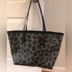 Coach Animal Print Large Tote Bag In Excellent Condition Colors: Grey & Black Great Bag Black Coated Canvas Shoulder Bag For Errands, Black Coated Canvas Tote Shoulder Bag, Gray Top Handle Bag With Handle Drop, Casual Coach Bags In Coated Canvas, Gray Shopping Bag With Top Carry Handle, Gray Bags With Leather Handles For Shopping, Gray Tote Bag For Shopping, Coach Tote Shoulder Bag With Gunmetal Hardware, Coach Shoulder Bag With Gunmetal Hardware For Shopping