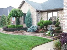 a house with landscaping in the front yard