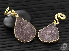 Solid Brass and Electroplated Amethyst Druzy Ear Weights by Diablo Organics Gold Amethyst Jewelry With Stones, Luxury Purple Drop Jewelry, Luxury Purple Teardrop Jewelry, Luxury Purple Natural Stones Jewelry, Luxury Purple Jewelry With Natural Stones, Luxury Teardrop Amethyst Jewelry, Amethyst Drop Jewelry With Gemstone Accents, Purple Drop Jewelry With Gemstone Accents, Teardrop Amethyst Stone Jewelry