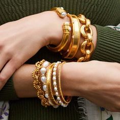 Add in some lavish arm candy with the Marbella Bangle, lightly hammered with beaded detail. The perfect way to add some sparkle to your life, Julie Vos jewelry is designed to be your daily dose of luxury. Each piece is handcrafted, set in 24k gold plate, and sealed to prevent tarnish. voss, julia, jewelry, bracelet, gold, bangle Maximalist Jewelry, Julia Jewelry, Julie Vos Jewelry, Pearl Bracelet Gold, Julie Vos, Accessory Jewelry, Gold Bangle, Pearl Shell, Jewelry Bracelet