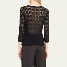 Vince top rendered from fine lace with a geometric motif Crew neckline Three-quarter sleeves Fitted Pullover style Cotton Hand wash or dry clean, wash separately Imported