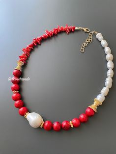 Introducing our exquisite Red Coral Round Coral and Baroque Pearl Gold-Plated Necklace--a radiant and elegant piece designed to enchant and captivate. Adorned with a combination of round red coral beads, baroque pearls, and gold-plated accents, this necklace is the perfect gift for her, whether it's for a beloved girlfriend or to celebrate a special anniversary. 🔴 Red Coral Beads: The necklace features round red coral beads, symbolizing energy, vitality, and passion--a vibrant and eye-catching Elegant Red Beaded Pearl Necklace, Elegant Red Pearl Necklace Gift, Elegant Red Single Strand Necklace, Elegant Red Pearl Necklace For Weddings, Elegant Beaded Red Coral Pearl Necklace, Handmade Elegant Red Coral Pearl Necklace, Elegant Red Coral Beaded Pearl Necklace, Elegant Red Coral Beaded Necklace, Elegant Coral Pearl Necklace With Round Beads